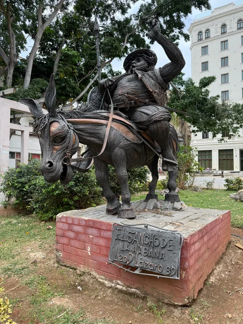 A metal sculpture of Sancho Panza on a donkey in Havana
